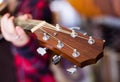 Close up of head of guitar