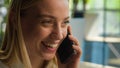 Close up head shot Caucasian businesswoman smiling girl talk mobile phone carefree woman laughing talking smartphone at Royalty Free Stock Photo