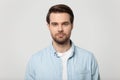 Close up head shot confident young man studio portrait. Royalty Free Stock Photo