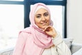 A close up head shot portrait of smiling Arabian woman in hijab Royalty Free Stock Photo