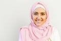 A close up head shot portrait of smiling Arabian woman in hijab Royalty Free Stock Photo
