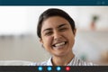 Young indian woman involved in funny distant video call talk. Royalty Free Stock Photo