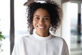 Close up portrait of smiling young african american businesswoman. Royalty Free Stock Photo