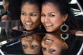 Close Up Head shot of 20s Asian Woman with Fashion make up over Mirror reflect her face Royalty Free Stock Photo