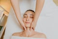 Close up head shot of Woman having curative neck massage Royalty Free Stock Photo