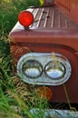 Close up of Headlight of an Abandoned Vintage and Rusty Truck Royalty Free Stock Photo