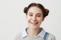 Close up headshot of absolutely happy woman giggling looking on camera with broad smile. Joyful emotions of easygoing Royalty Free Stock Photo