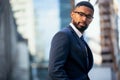 Close up headshot portrait of african american business professional, stylish modern glasses, intelligent and successful Royalty Free Stock Photo