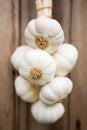 Close Up Of Healthy Bunch Of Garlic Bulbs On Wooden Background Royalty Free Stock Photo