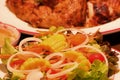 Close up of Healthy green salad with corn on white plate. vegetarian food. Royalty Free Stock Photo