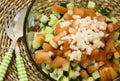 Close up of healthy simple salad with chopped onion on top