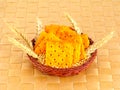 Close up healthy whole wheat cracker in basket on brown background