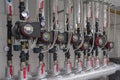 Close-up of a Heating System with Pipes, Pumps and Gauges Royalty Free Stock Photo