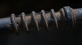 Rusty Relic: A Close-Up of Corrosion and Cobwebs on Aged Metal Object Under Shadows