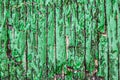 Close Up of a Heavily Weathered and Cracked Painted Wood Door