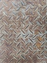 Close-up of heavily weathered  rusty diamond plate steel texture Royalty Free Stock Photo