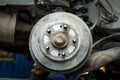 Close-up of heavily worn rear drum brakes