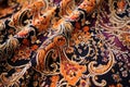 close-up of heavy brocade fabric with intricate patterns