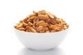 Close up of Heeng jeera Peanuts mixture Indian namkeen snacks on a ceramic white bowl. Royalty Free Stock Photo