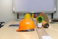 Close up of helmet and etc. on architect desk, architectural concept Royalty Free Stock Photo