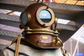 Close-up helmet Old vintage three-bolt deep-sea diving suit. Suit for deep sea diving of the last century. The history Royalty Free Stock Photo