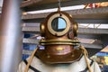 Close-up helmet Old vintage three-bolt deep-sea diving suit. Suit for deep sea diving of the last century. The history Royalty Free Stock Photo