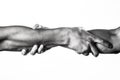 Close up help hand. Two hands, helping arm of a friend, teamwork. Helping hand concept and international day of peace Royalty Free Stock Photo
