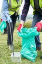 Close Up Of Helpful Senior Couple Collecting Litter In Countryside Royalty Free Stock Photo