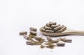 Close up herbal capsules isolate on white background. Royalty Free Stock Photo