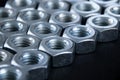 Close up hex nuts put row abstract style