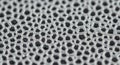 Intricate white hexagonal mesh pattern with dark background close up showing depth of field and detailed structure Royalty Free Stock Photo