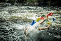 Spiritual man swims by tibetan flags Royalty Free Stock Photo