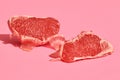 Close up high quality image of peeled slices of juicy grapefruit on a pink background Royalty Free Stock Photo