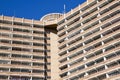 Close Up of High Rise Apartment Building Against Blue Sky Royalty Free Stock Photo