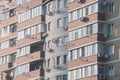 Close-up. High-rise windows with air conditioning and balconies. The concept of overpopulation of planet Royalty Free Stock Photo