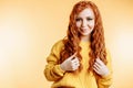 Close up highly detailed portrait of happy and cheerful caucasian female with cute smile, long ginger hair and perfect healthy Royalty Free Stock Photo