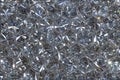 Close up on an highly detailed texture background depicting shining diamonds.