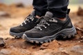 Close up of hiker outdoors walking on a trail with comfortable and durable hiking shoes