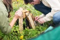 Close up of hikers kindling fire Royalty Free Stock Photo