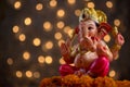 Hindu God Ganesha on Blured bokeh background, Ganesha Idol Royalty Free Stock Photo