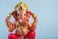 Hindu God Ganesha. Ganesha Idol on blue background