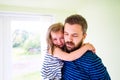 Close up of hipster father holding his crying daughter Royalty Free Stock Photo