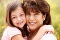 Close up of hispanic grandmother and granddaughter Royalty Free Stock Photo