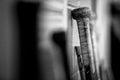 Close-up of hockey sticks resting on the arena wall