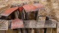 Close up of Hoes, tool used to loosen the soil in the vegetable garden, stored, in a garden shed Royalty Free Stock Photo