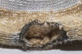 Hole in a wool sock Royalty Free Stock Photo