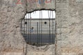 Hole in Berlin Wall with Graffiti Royalty Free Stock Photo