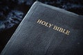 Close up of Holy Bible dark blue black leather cover Royalty Free Stock Photo