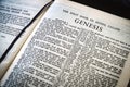 Close up of Holy Bible page, shallow depth of field with focus on book chapter, heading