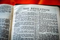 Close up of Holy Bible page, shallow depth of field with focus on book chapter, heading